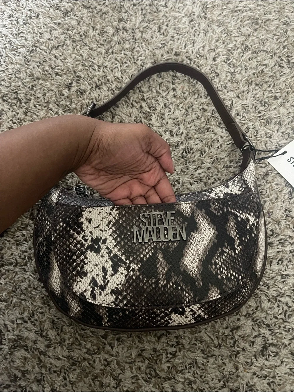 Steve Madden compact steve